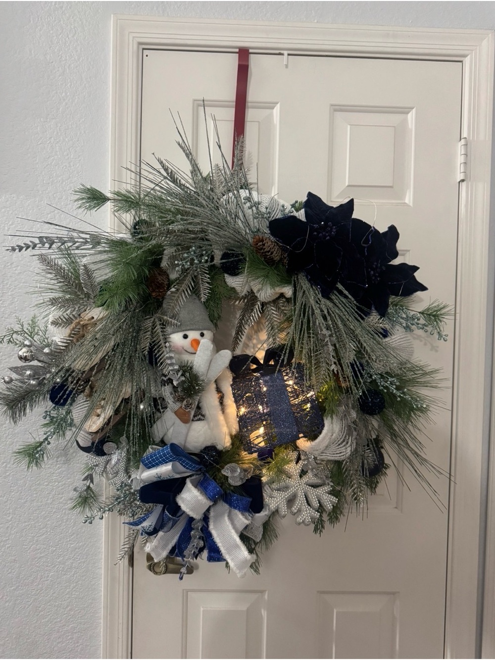 Holiday Snowman Pine Wreath with Blue Accents, Fairy lights and Lighted Gift - Picture 2 of 5